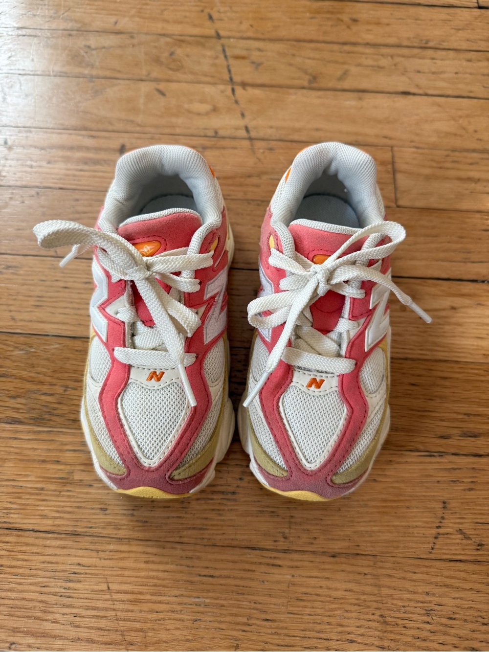 New Balance Kids Coral Pink and White Sneakers